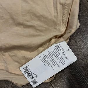 Brand new with tags lululemon back in action short sleeved shirt